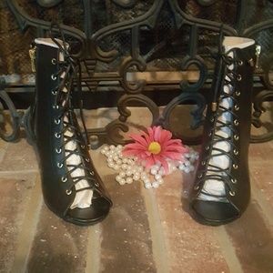 Brand new lace up high heeled half boots